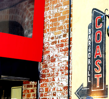 Coast bar and grill sign outside